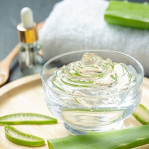 aloe vera cosmetic cream on dark background