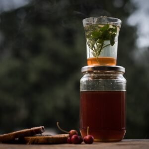 closeup shot of a healthy homemade drink in a jar with a blurry background