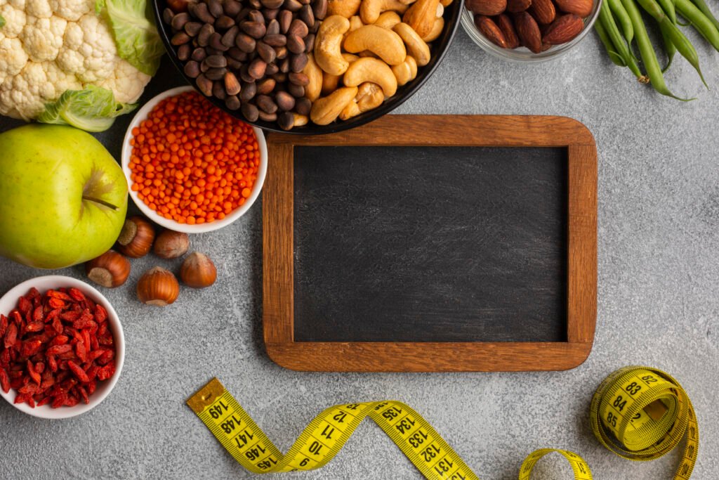 Weight Management Tips flay lay groceries chalkboard