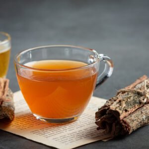 hot tea and bark on table