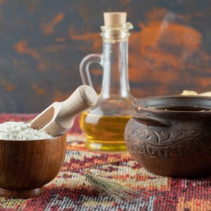 raw spiral pasta in pot with fettuccine uncooked macaroni