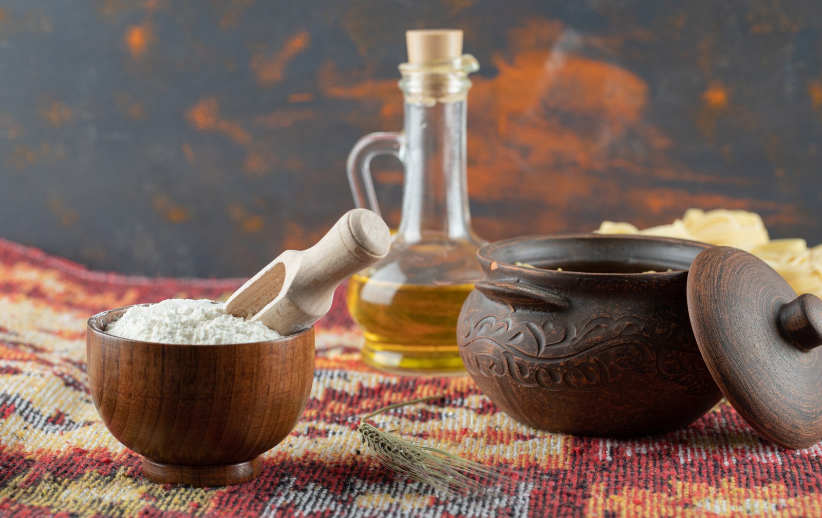 raw spiral pasta in pot with fettuccine uncooked macaroni